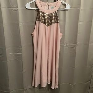 Sleeveless high neckline flowy knee length dress